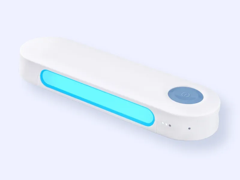 A white, rectangular handheld UV-C sterilizer with a glowing blue light strip and a circular power button on top, placed on a light background.