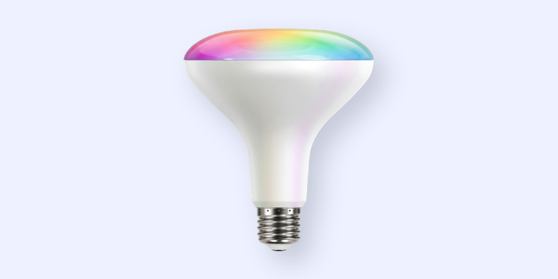 A white LED light bulb with a standard screw base and a top section glowing in multiple colors, including pink, blue, green, and yellow, against a light background.