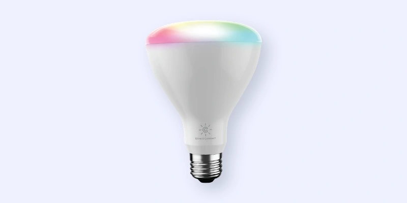 A white smart light bulb with a standard screw base, featuring a soft glow of pastel colors—pink, green, and blue—around its top edge, displayed against a light gray background.