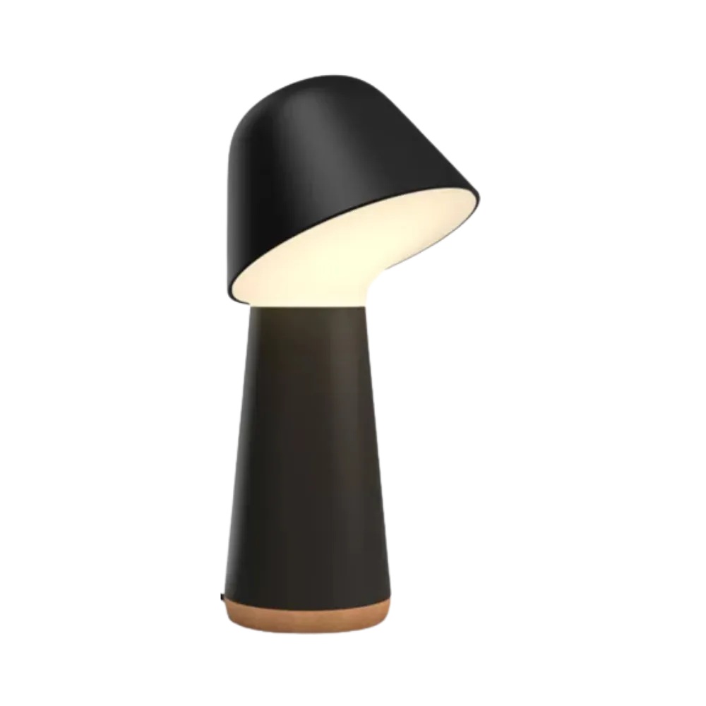 Modern black mushroom table lamp with tilted shade and cork base, minimalist Scandinavian design