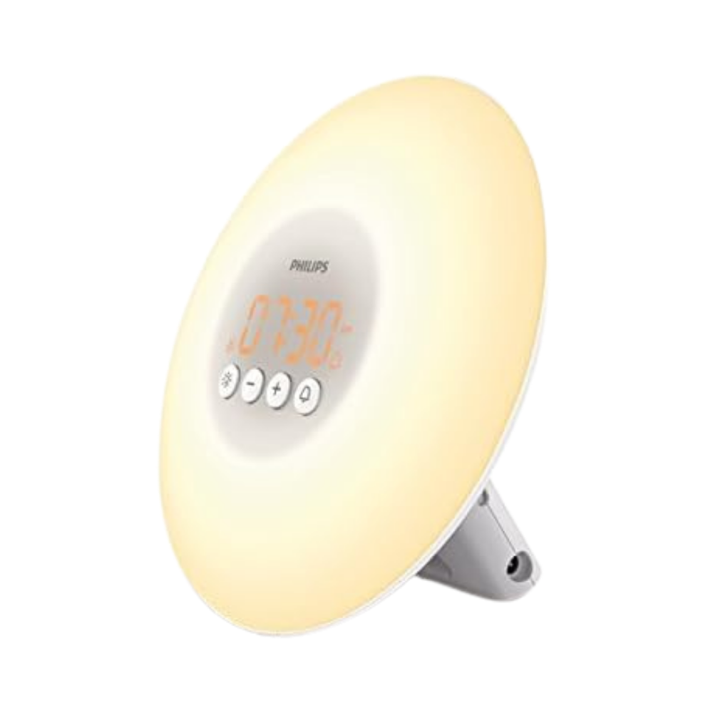 Philips wake-up light alarm clock with warm sunrise simulation and digital display showing 7:30