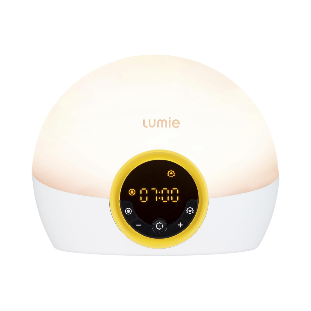 Lumie Bodyclock wake-up light alarm clock displaying 7:00, white dome shape with yellow accents