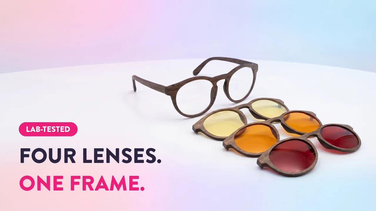 Wood frame glasses with four interchangeable clip-on lenses in clear, yellow, orange, and red tints — lab-tested eyewear