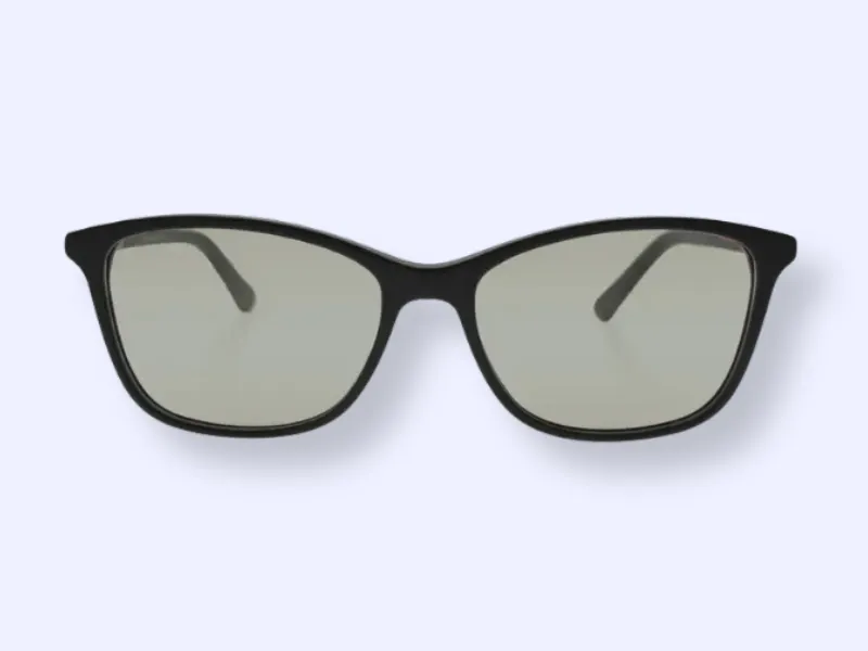 A pair of black-rimmed eyeglasses with slightly rounded rectangular lenses, displayed against a light gray background.