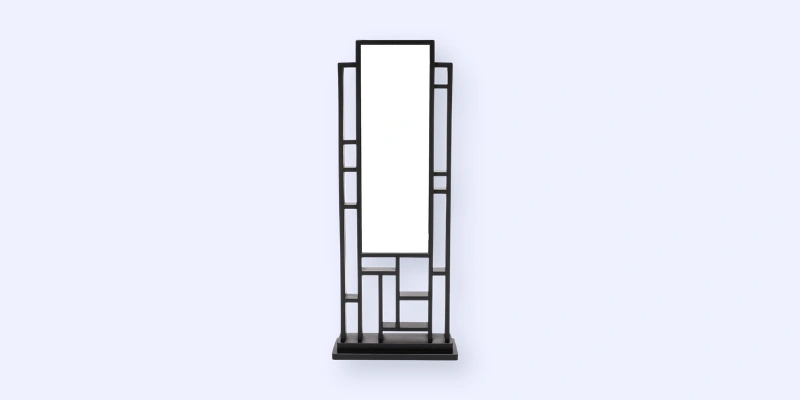 A modern rectangular mirror with a black geometric frame featuring various intersecting rectangles and squares, mounted on a black base against a light background.