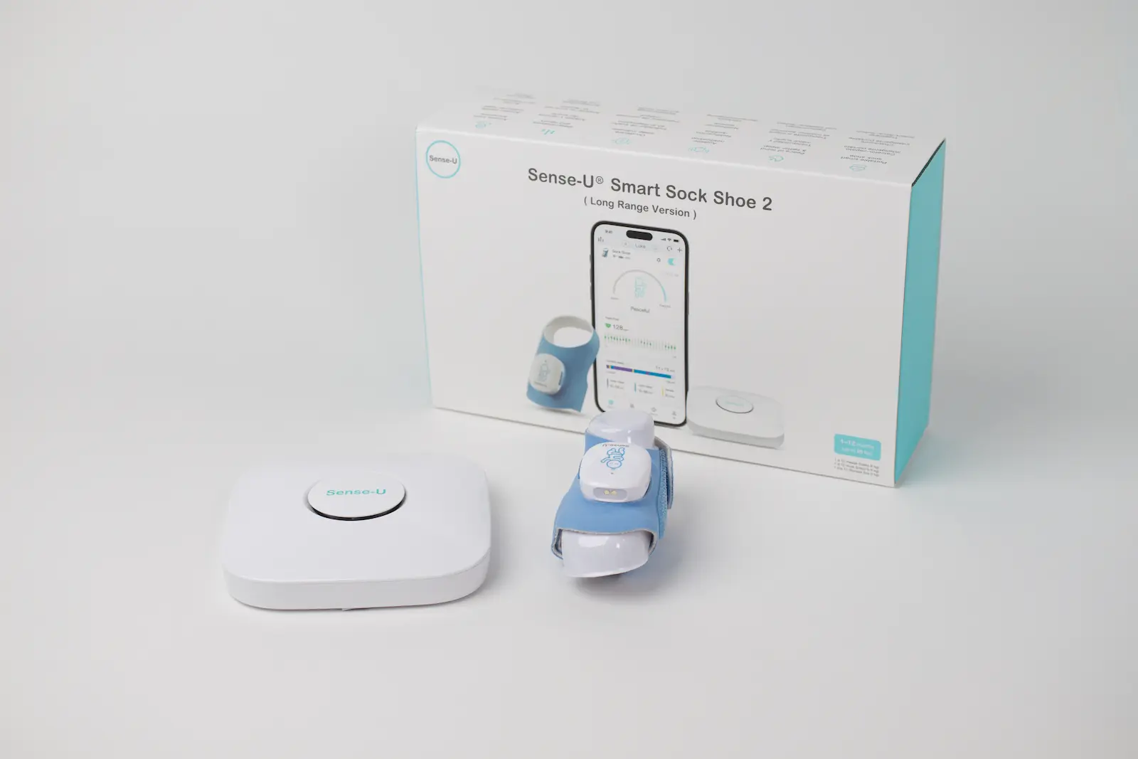 Sense-U Smart Sock Shoe 2 Long Range baby monitor set with hub device, foot sensor sock, and product box