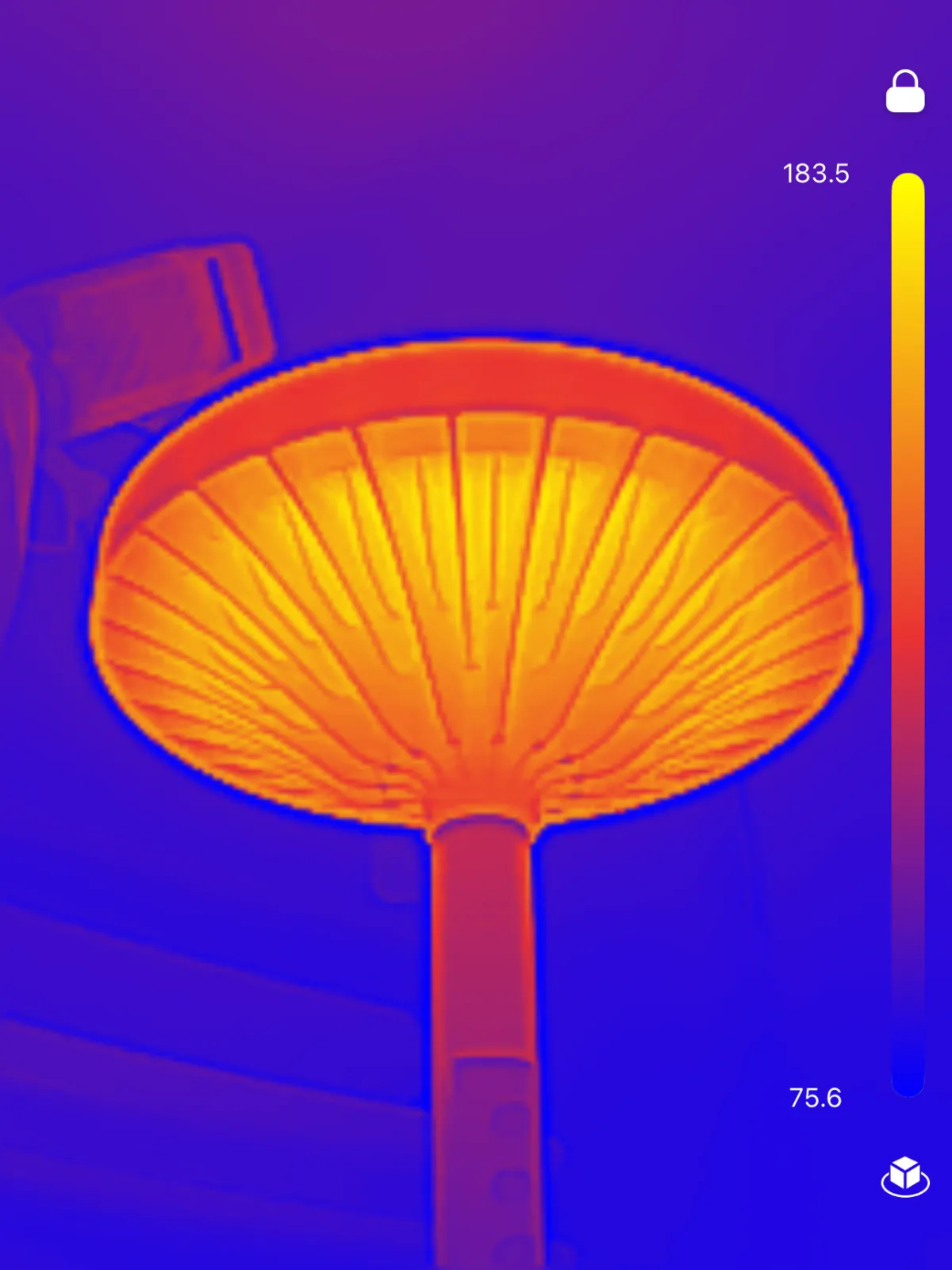 Thermal imaging of a mushroom-shaped lamp shade showing heat distribution from 75.6°F to 183.5°F in infrared colors