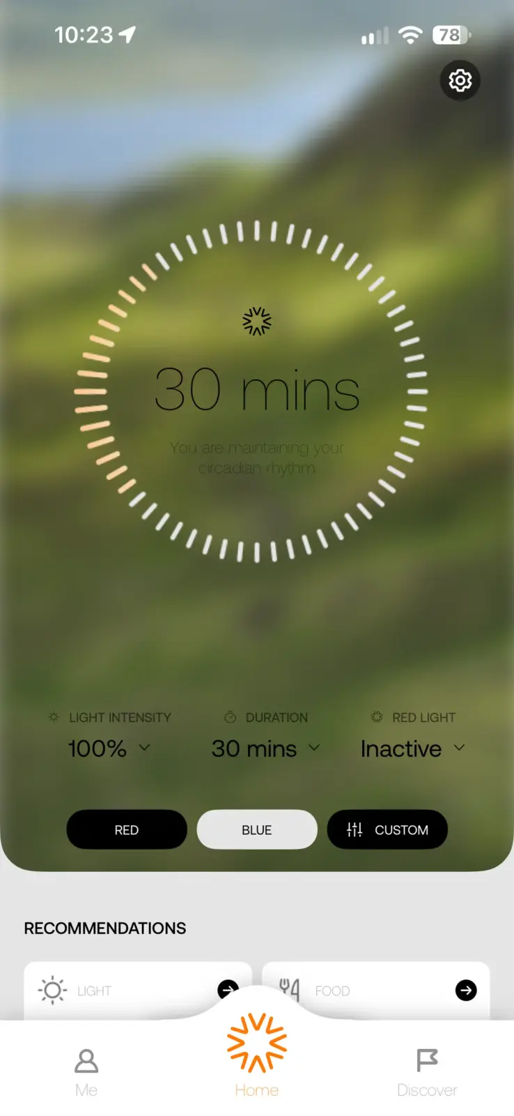 Circadian rhythm light therapy app showing 30-minute blue light session at 100% intensity with timer and red light controls