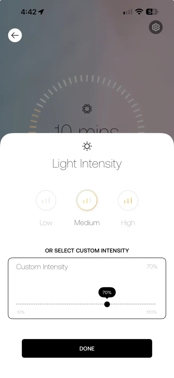 Light intensity settings screen showing Low, Medium, High options with custom intensity slider set to 70% in a smart lighting